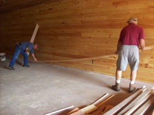 Members of the Historical Society work on the interior of the new museum Saturday during its scheduled workday.